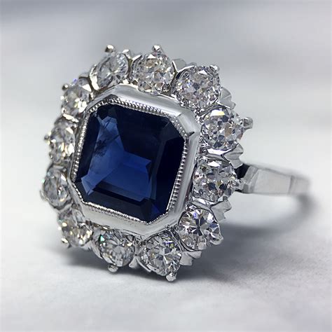 Kashmir sapphire and diamond three stone ring, circa 1915. . Sapphire vintage engagement rings 1920s